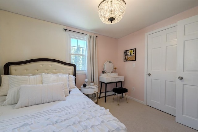37 Hillcrest Ave, Methuen, MA 01844 - bedroom with carpet flooring, a chandelier, a baseboard radiator, and baseboards