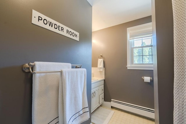 37 Hillcrest Ave, Methuen, MA 01844 - bathroom with a baseboard heating unit, vanity, tile patterned floors, and baseboards