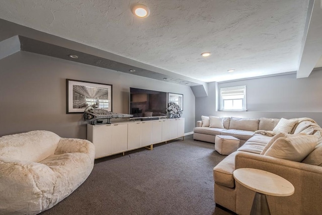 37 Hillcrest Ave, Methuen, MA 01844 - living area featuring dark carpet, a textured ceiling, and recessed lighting