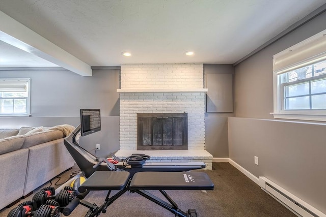 37 Hillcrest Ave, Methuen, MA 01844 - workout area with baseboard heating, carpet floors, a fireplace, healthy amount of natural light, and recessed lighting