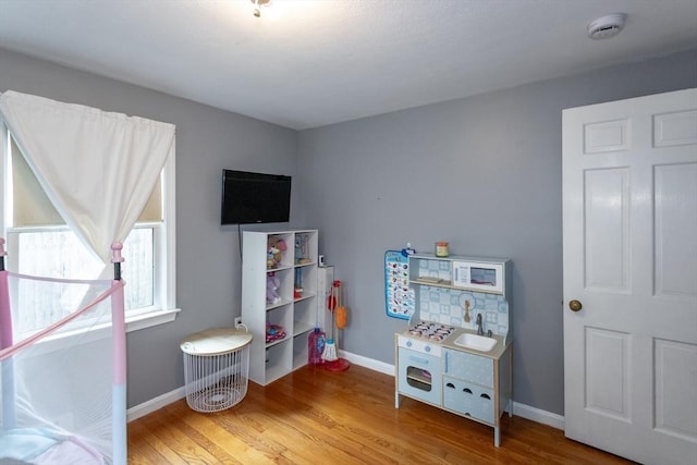 67 Donbray Rd, Springfield, MA 01119 - rec room with wood finished floors and baseboards