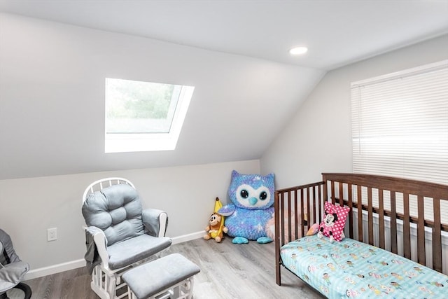 67 Donbray Rd, Springfield, MA 01119 - bedroom with wood finished floors, lofted ceiling, a skylight, and baseboards