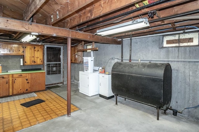 67 Donbray Rd, Springfield, MA 01119 - below grade area with oil tank and separate washer and dryer