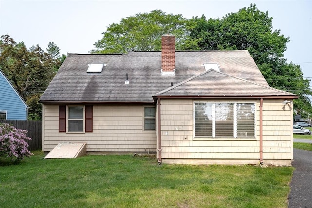 67 Donbray Rd, Springfield, MA 01119 - back of house with a chimney and a shingled roof