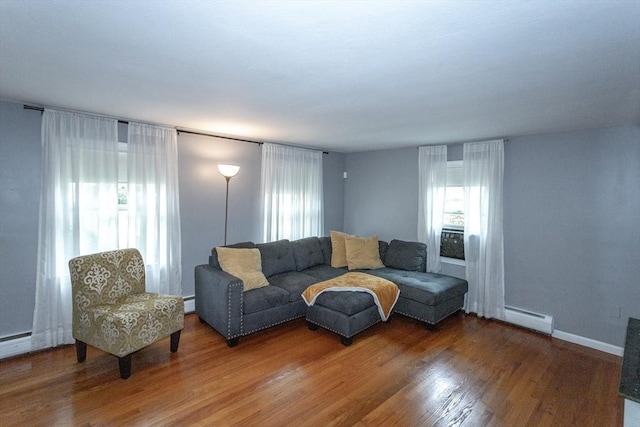 67 Donbray Rd, Springfield, MA 01119 - living room featuring a baseboard radiator, plenty of natural light, and wood finished floors