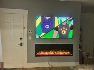 59-61 Waite St, Malden, MA 02148 - detailed view of a warm lit fireplace