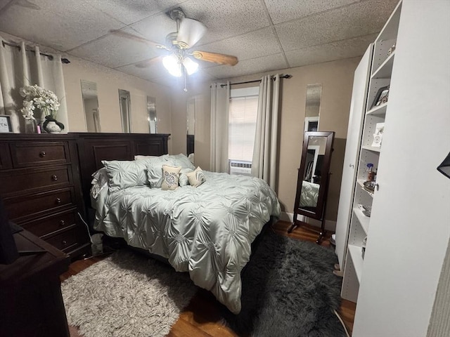 59-61 Waite St, Malden, MA 02148 - bedroom featuring dark wood-style floors, a drop ceiling, and ceiling fan