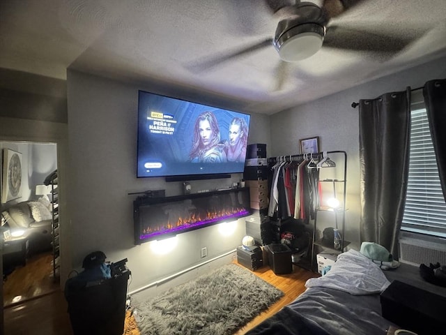 59-61 Waite St, Malden, MA 02148 - cinema featuring ceiling fan, wood finished floors, and a textured ceiling