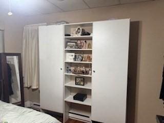 59-61 Waite St, Malden, MA 02148 - bedroom with a baseboard radiator