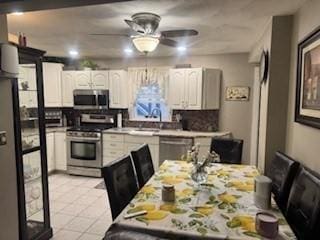 59-61 Waite St, Malden, MA 02148 - dining room featuring ceiling fan