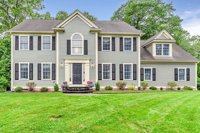 4 Kattail Rd, Hudson, MA 01749 - colonial home with a front lawn and roof with shingles