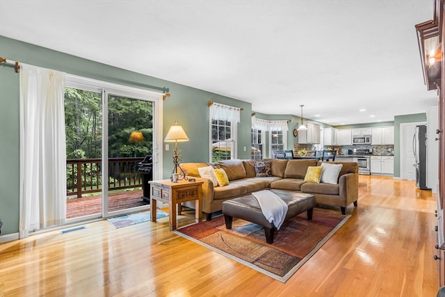 4 Kattail Rd, Hudson, MA 01749 - living room featuring light wood-style flooring