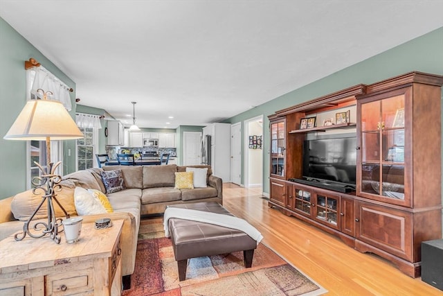 4 Kattail Rd, Hudson, MA 01749 - living room with light wood-style flooring and recessed lighting