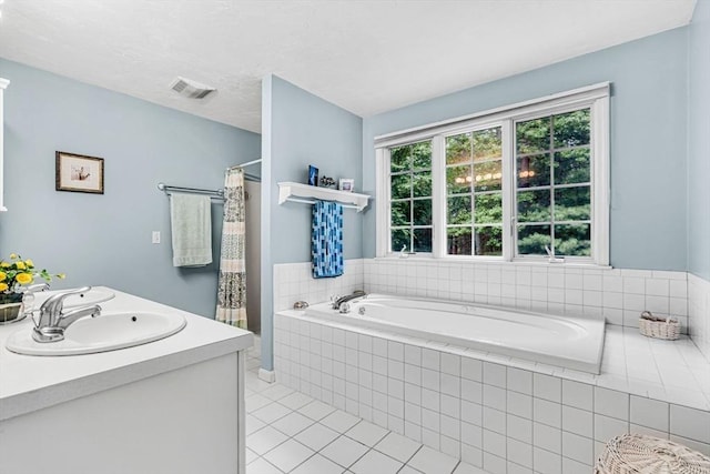 4 Kattail Rd, Hudson, MA 01749 - bathroom featuring tile patterned floors, a garden tub, and a shower with shower curtain