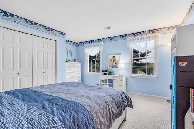 4 Kattail Rd, Hudson, MA 01749 - carpeted bedroom with a closet and multiple windows