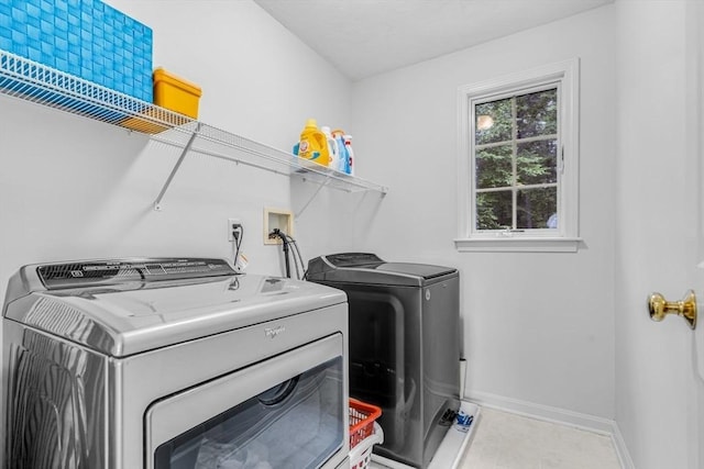 4 Kattail Rd, Hudson, MA 01749 - washroom featuring washing machine and dryer and baseboards