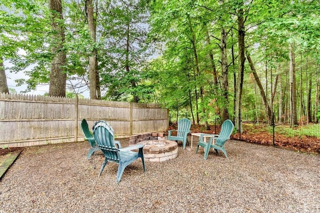 4 Kattail Rd, Hudson, MA 01749 - view of patio featuring an outdoor fire pit