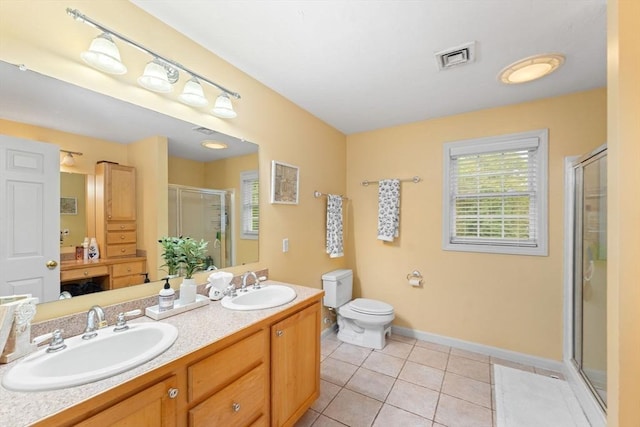 16 Preserve Way, Sturbridge, MA 01566 - full bath featuring a shower stall, double vanity, tile patterned floors, baseboards, and toilet