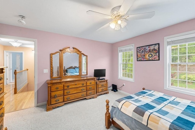 16 Preserve Way, Sturbridge, MA 01566 - carpeted bedroom featuring multiple windows, baseboards, and a ceiling fan