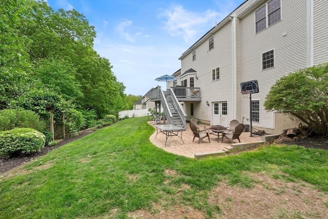 16 Preserve Way, Sturbridge, MA 01566 - back of house with stairs, a deck, a patio, and an outdoor fire pit