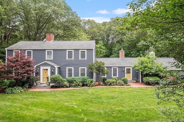 22 High St, Southborough, MA 01772 - colonial inspired home with a chimney and a front yard