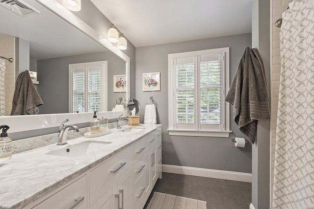 22 High St, Southborough, MA 01772 - full bathroom featuring double vanity, healthy amount of natural light, and a shower with curtain