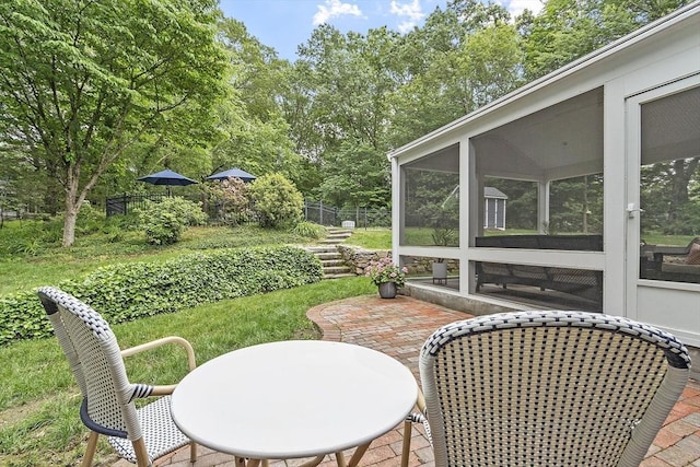 22 High St, Southborough, MA 01772 - view of patio with a sunroom and view of wooded area