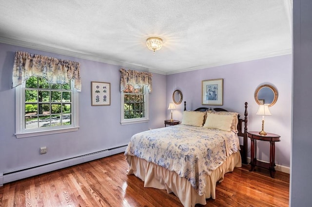 38 Lincoln Cir E, Andover, MA 01810 - bedroom featuring a baseboard heating unit, crown molding, and wood finished floors