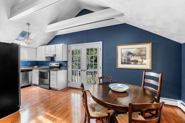 38 Lincoln Cir E, Andover, MA 01810 - dining space with lofted ceiling, light wood-type flooring, and a chandelier