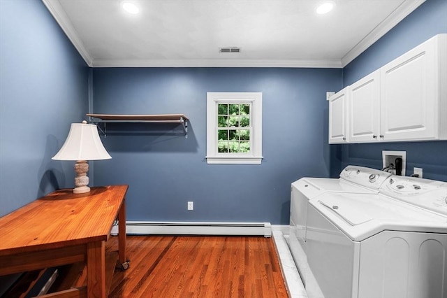 38 Lincoln Cir E, Andover, MA 01810 - washroom with cabinet space, baseboard heating, independent washer and dryer, crown molding, and wood finished floors