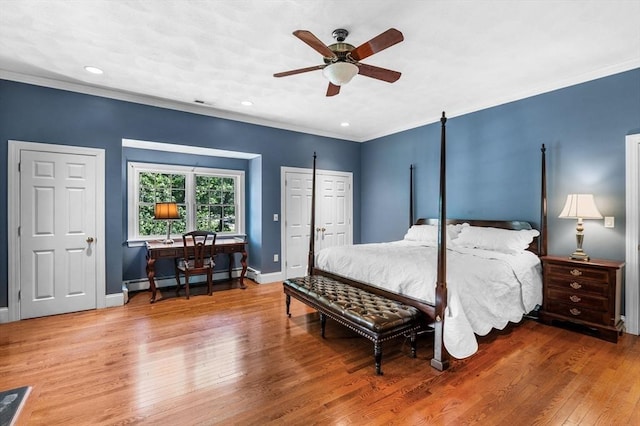 38 Lincoln Cir E, Andover, MA 01810 - bedroom with a baseboard heating unit, ornamental molding, wood finished floors, recessed lighting, and ceiling fan