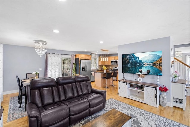 29 Regatta Dr, Attleboro, MA 02703 - living area featuring a chandelier, light wood-style floors, baseboards, and recessed lighting