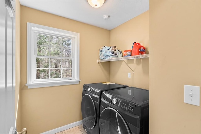 29 Regatta Dr, Attleboro, MA 02703 - laundry area with washer and clothes dryer, light tile patterned flooring, laundry area, and baseboards