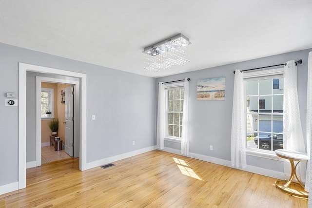 29 Regatta Dr, Attleboro, MA 02703 - empty room featuring light wood-style floors, baseboards, and visible vents
