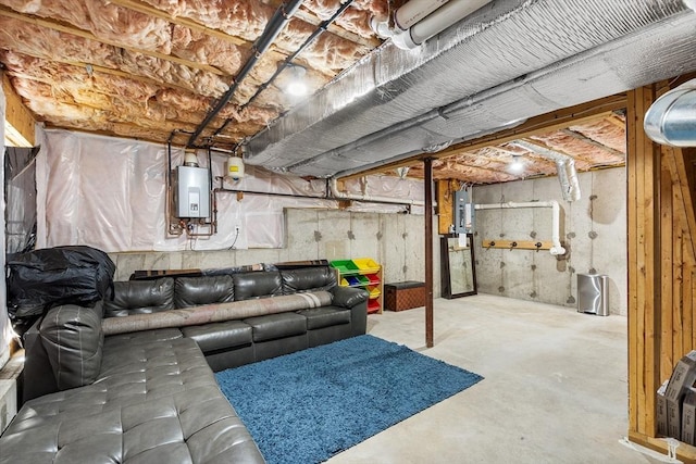 29 Regatta Dr, Attleboro, MA 02703 - living room with concrete floors, tankless water heater, and electric panel