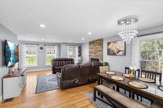 29 Regatta Dr, Attleboro, MA 02703 - dining room with light wood-type flooring, a fireplace, baseboards, and recessed lighting