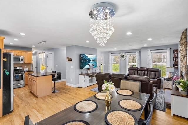 29 Regatta Dr, Attleboro, MA 02703 - dining space with recessed lighting, light wood-style floors, and an inviting chandelier