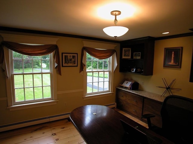 entryway featuring baseboard heating and plenty of natural light