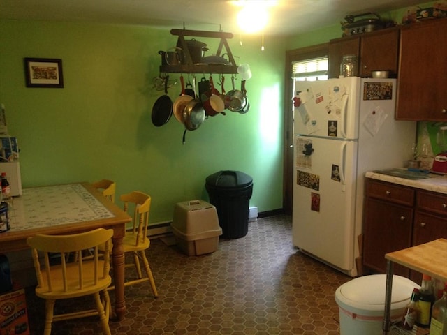 1302 Federal St Unit 20, Belchertown, MA 01007 - kitchen featuring dark flooring, light countertops, and freestanding refrigerator