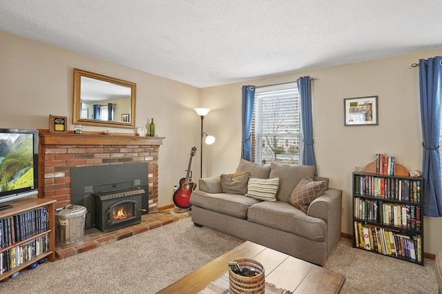 carpeted living area featuring a textured ceiling and baseboards