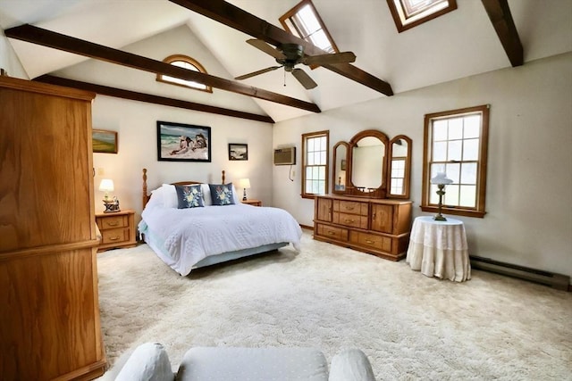 bedroom with carpet flooring, a baseboard heating unit, beam ceiling, a skylight, and multiple windows