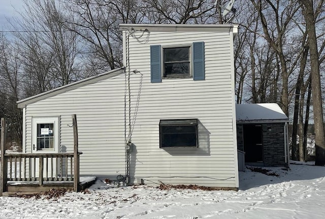 view of snow covered property