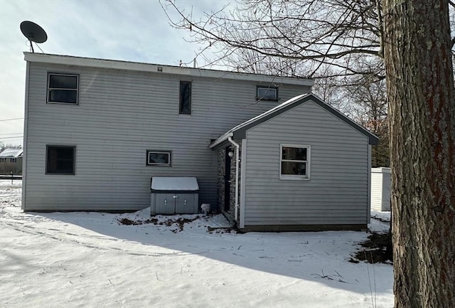 view of snow covered house