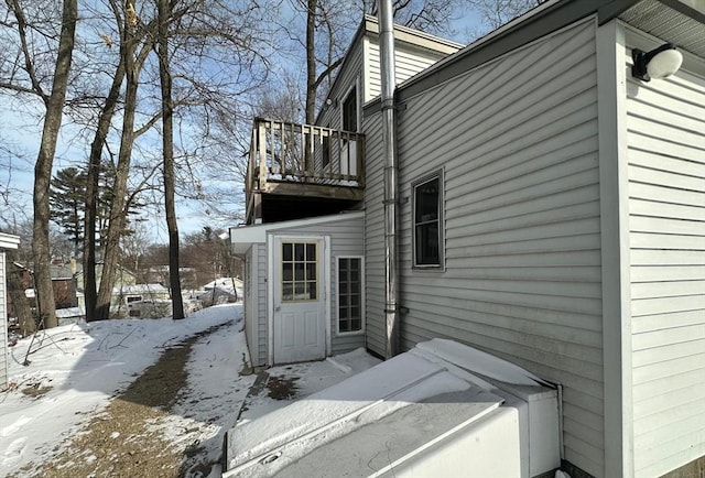 view of snow covered property