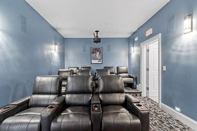 home theater room with baseboards and visible vents