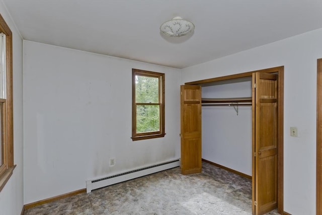 245 State Rd, Phillipston, MA 01331 - unfurnished bedroom with a baseboard heating unit, a closet, and carpet