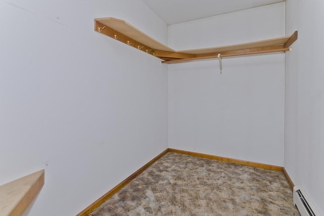 245 State Rd, Phillipston, MA 01331 - walk in closet featuring baseboard heating and carpet