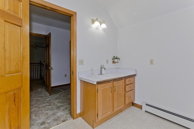 245 State Rd, Phillipston, MA 01331 - bathroom featuring baseboard heating, vaulted ceiling, and vanity