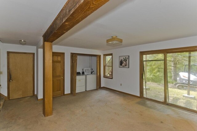 245 State Rd, Phillipston, MA 01331 - unfurnished bedroom featuring washer and dryer, access to exterior, and light colored carpet