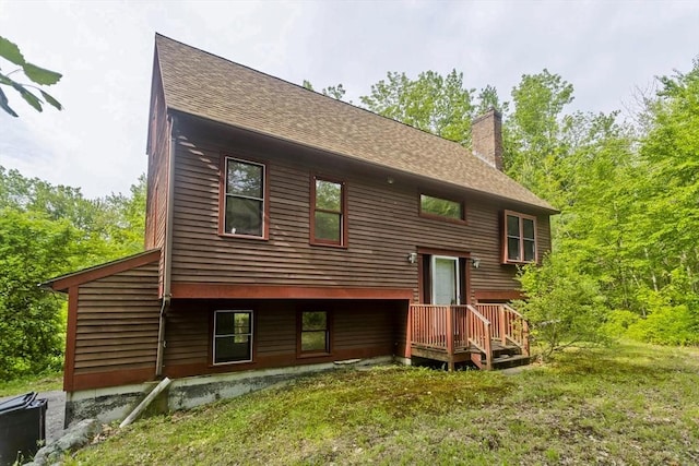 245 State Rd, Phillipston, MA 01331 - back of house with roof with shingles, a chimney, and a lawn